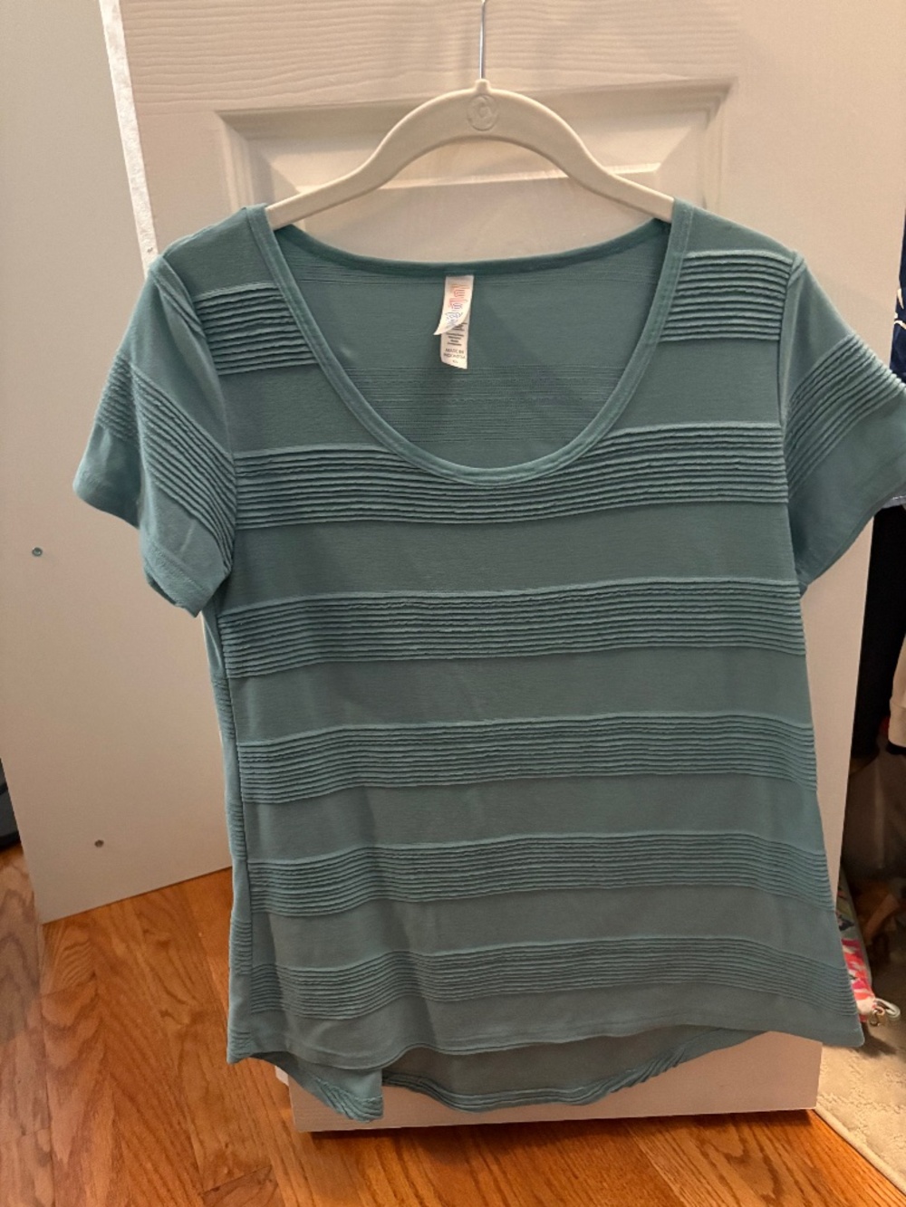 LuLaRoe teal shirt XS like new